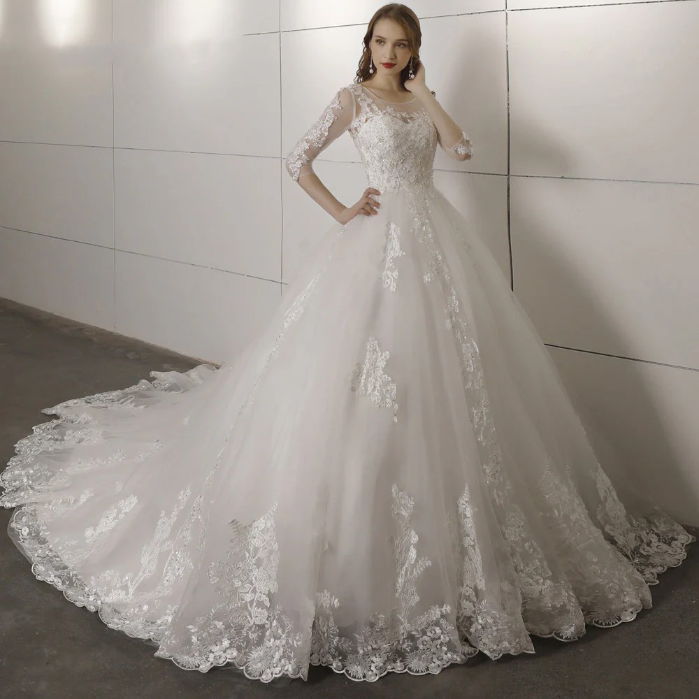 Long sleeve lace ball gown wedding dress